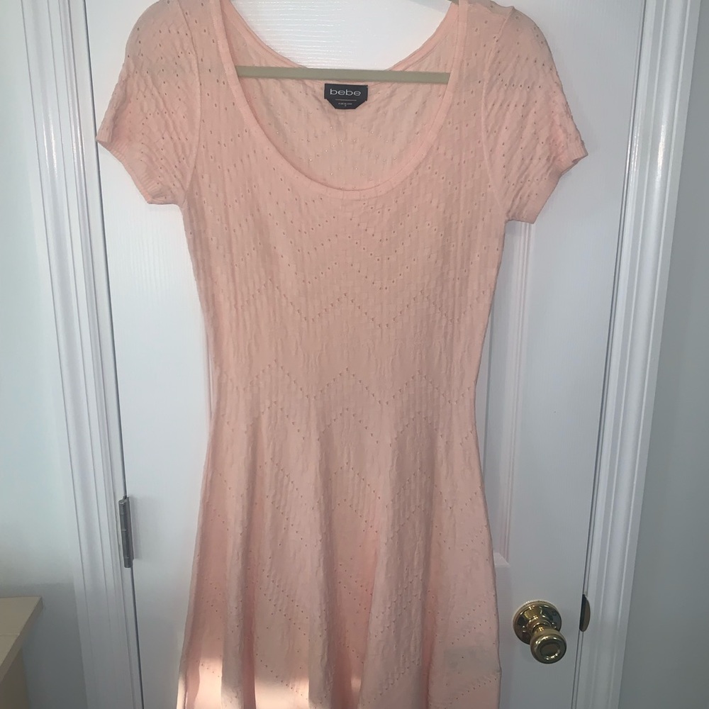 Bebe light pink laser cut skater dress